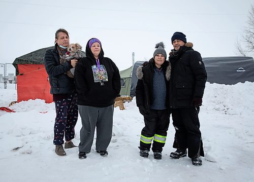 JESSICA LEE / WINNIPEG FREE PRESS

Protestors (from left to right) Alaya McIvor, Jolene Wilson, Melissa Normand and George Robinson are photographed at the encampment at Brady Landfill on December 27, 2022.

Reporter: Chris Kitching