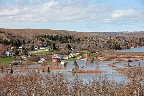 Brandon Sun 16052022

Flood water from the swollen Little Saskatchewan River covers low area&#x2019;s between the Minnedosa Lake dam and the town of Minnedosa on Monday.

(Tim Smith/The Brandon Sun)