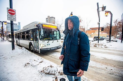 MIKAELA MACKENZIE / WINNIPEG FREE PRESS

Normand Bedard talks to a reporter at a downtown Winnipeg Transit stop on Graham Avenue on Tuesday, Dec. 27, 2022. For Tyler story.
Winnipeg Free Press 2022.