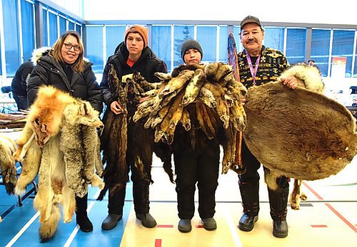 Photos by Shel Zolkewich / Winnipeg Free Press
The Lavallee family from Easterville arrives at the fur tables ready to make some deals. Pictured are grandma Donna, Kraven, Carlos Jr. and grandpa Wayne Sr.