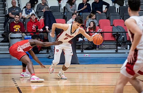 JESSICA LEE / WINNIPEG FREE PRESS

University of Winnipeg Wesmen player Alberto Gordo (9) dribbles the ball during a game against the University of Algoma Thunderbirds at the Duckworth Centre on December 28, 2022.

Reporter: Mike Sawatzky