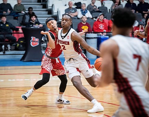 JESSICA LEE / WINNIPEG FREE PRESS

University of Winnipeg Wesmen player Emmanuel Thomas (2) dribbles the ball during a game against the University of Algoma Thunderbirds at the Duckworth Centre on December 28, 2022.

Reporter: Mike Sawatzky