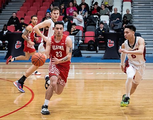 JESSICA LEE / WINNIPEG FREE PRESS

University of Algoma Thunderbirds player Fabrice Watier-Berthiaume dribbles the ball during a game against the University of Winnipeg Wesmen at the Duckworth Centre on December 28, 2022.

Reporter: Mike Sawatzky