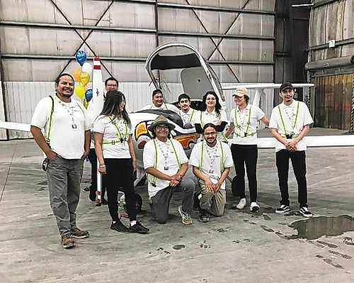 MARTIN CASH / WINNIPEG FREE PRESS The inaugural group of trainees in the Atik Mason Indigenous Pilot Pathway at the Calm Air hangar in Winnipeg. 