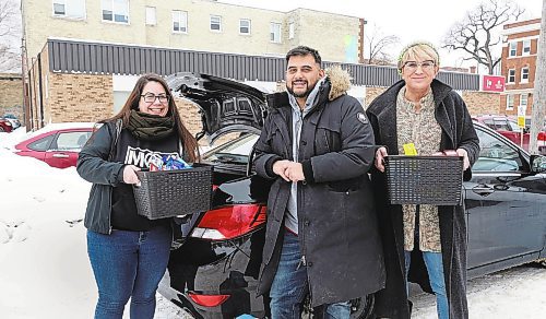 RUTH BONNEVILLE / WINNIPEG FREE PRESS 

Philanthropy - Mutual Aid Society

Photo of  Sarah Ruff (left) with Lara Ray (right) who help organize and deliver items with founder Omar Kinnarath (centre), next to Sarah's car full of items to be delivered.  


Story: Philanthropy. The Mutual Aid Society Winnipeg is a grassroots volunteer initiative started by Omar Kinnarath (centre) in March 2020 as a result of increasing need at the beginning of the pandemic. The Facebook group with over 14,000 members helps connect those in need with those able to provide assistance, mostly food, meals and everyday supplies (diapers, formula, clothing etc). The needs continue to be huge and the group has become an important way for those who are struggling to connect with those willing to help. No questions asked. Community members helping community members.


Reporter: Janine LeGal

Dec 28th,  2022