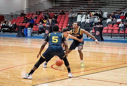 JESSICA LEE / WINNIPEG FREE PRESS

University of Winnipeg Wesmen player Shawn Maranan (5) dribbles the ball during a game against the University of Brandon Bobcats at Duckworth Centre on December 29, 2022.

Reporter: Mike Sawatzky