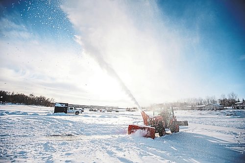 MIKAELA MACKENZIE / WINNIPEG FREE PRESS

Collin Stone clears roads for an ice fishing village on the river in Lockport on Friday, Dec. 30, 2022. For Malak story.
Winnipeg Free Press 2022.