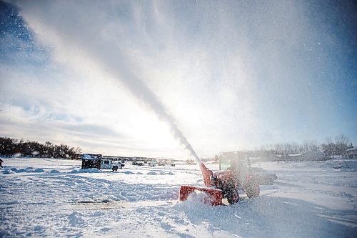 MIKAELA MACKENZIE / WINNIPEG FREE PRESS

Collin Stone clears roads for an ice fishing village on the river in Lockport on Friday, Dec. 30, 2022. For Malak story.
Winnipeg Free Press 2022.