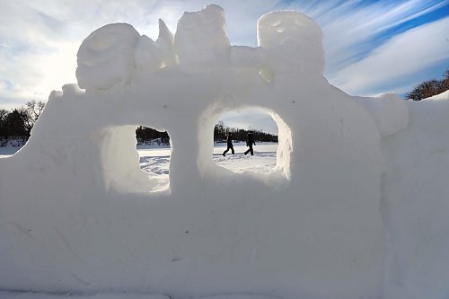RUTH BONNEVILLE / WINNIPEG FREE PRESS 

Local - Assiniboine River Trail

People are seen walking along a trail on the Assiniboine River through holes in a snow sculpture created by residents living along the riverfront of Assiniboine River Friday. 

Part of collection of images of area residents readying river for NYE.
Residents that live along the Assiniboine River on Assiniboine Ave. work to prep the river for New Years Eve activities on Friday.


Dec 30th,  2022