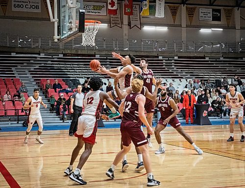JESSICA LEE / WINNIPEG FREE PRESS

University of Winnipeg Wesmen player Malachi Alexander shoots the ball during a game against the University of Ottawa Gee-Gees at the Duckworth Centre on December 30, 2022

Reporter: Mike Sawatzky
