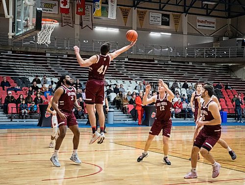 JESSICA LEE / WINNIPEG FREE PRESS

University of Ottawa Gee-Gees player Guillaume Pepin grabs the ball during a game against the University of Winnipeg Wesmen at the Duckworth Centre on December 30, 2022

Reporter: Mike Sawatzky