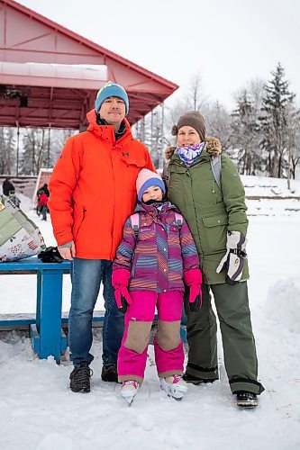 Daniel Crump / Winnipeg Free Press. Greg Ducharme (left) and Sarah Ducharme spend the afternoon at the Forks in Winnipeg with their daughter Madeline. December 31, 2022.