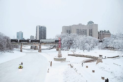 Daniel Crump / Winnipeg Free Press. A zamboni helps ready the river trail at the Forks in Winnipeg on New Year&#x573; Eve. December 31, 2022.