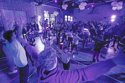 Daniel Crump / Winnipeg Free Press. People take part in an all ages dance party at the Forks in Winnipeg on New Year&#x573; Eve. December 31, 2022.