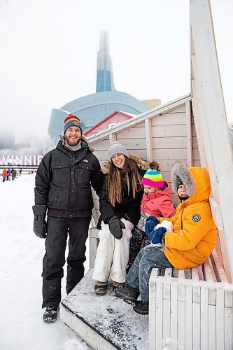 Daniel Crump / Winnipeg Free Press. Andrew Thorne (left) and Sara Thorne spent the afternoon with their kids Piper and William at the Forks in Winnipeg on New Year&#x573; Eve. December 31, 2022.