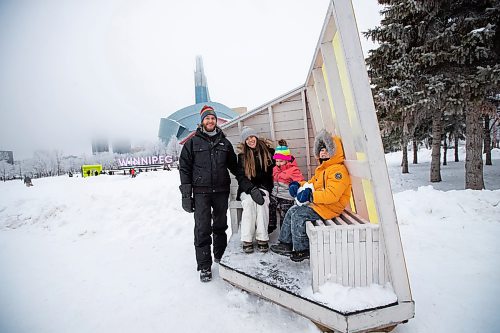 Daniel Crump / Winnipeg Free Press. Andrew Thorne (left) and Sara Thorne spent the afternoon with their kids Piper and William at the Forks in Winnipeg on New Year&#x573; Eve. December 31, 2022.