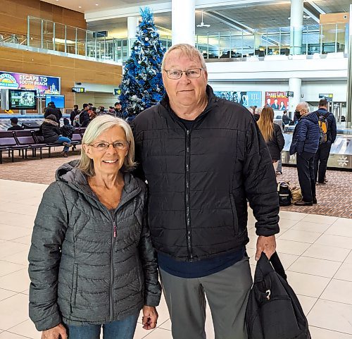 Chris Kitching / Winnipeg Free Press
Mardelle and Gwynn Williams, from Melfort, Sask., were waiting for a flight to Saskatoon on Monday, after arriving in Winnipeg around 1:30 a.m. on a Sunwing plane carrying customers who were stranded in Puerto Vallarta, Mexico, for days.