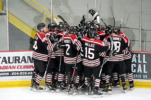 The Virden Oil Capitals celebrate an overtime win over the Waywayseecappo Wolverines in September. (Lucas Punkari/The Brandon Sun)