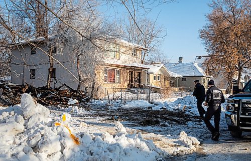 JESSICA LEE / WINNIPEG FREE PRESS

Winnipeg Fire Paramedic Service workers walk towards the remains of a fire on Stella Ave. on January 3, 2023.

Reporter: Malak Abas