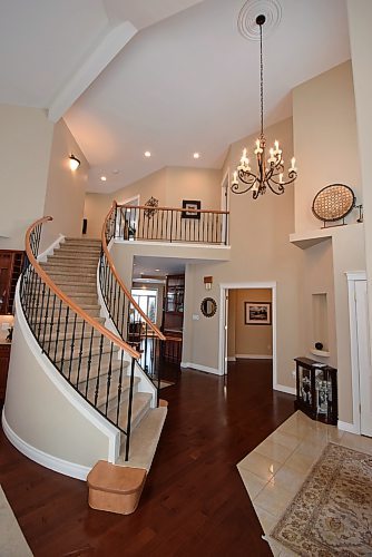Photos by Todd Lewys / Winnipeg Free Press
A grand, curved staircase greets you the instant you step into the home's spacious, airy foyer.