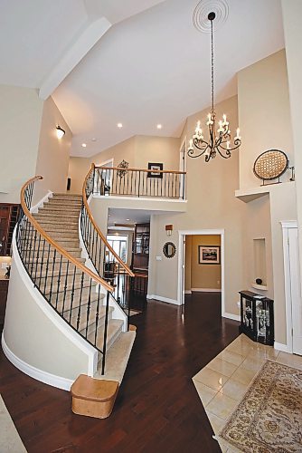 Photos by Todd Lewys / Winnipeg Free Press
A grand, curved staircase greets you the instant you step into the home's spacious, airy foyer.