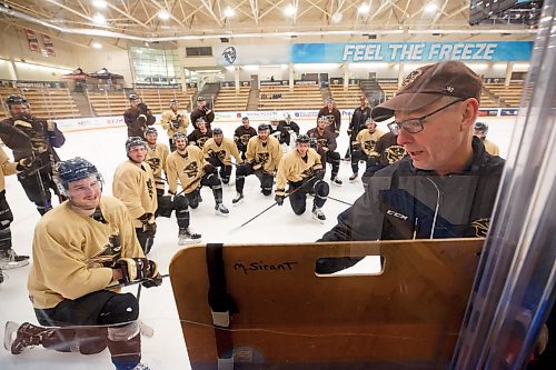 MIKE DEAL / WINNIPEG FREE PRESS
University of Manitoba Bisons Men's Hockey head coach, Mike Sirant, during practice at the Wayne Fleming Arena Wednesday morning, will be retiring in June after three decades of running the program.
See Mike Sawatzky story
230104 - Wednesday, January 04, 2023.