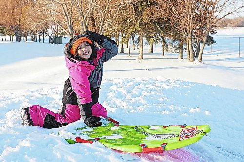 04012023
Waverley Elk-Hotain smiles while tobogganing with family at Sioux Valley Dakota Nation on a sunny Wednesday afternoon. 
(Tim Smith/The Brandon Sun)