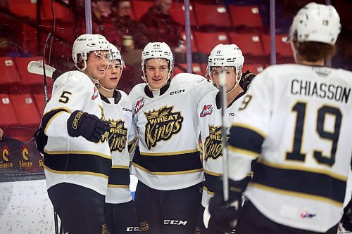 Trae Johnson, centre, and the Brandon Wheat Kings celebrate a goal during their 6-2 win over the Regina Pats in Western Hockey League action at Westoba Place on Wednesday evening. 
(Tim Smith/The Brandon Sun)