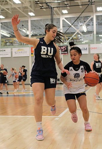 Noah Garcia defends Rae Lee Torino during Brandon University Bobcats women's basketball practice on Wednesday. The Bobcats are hoping to get their forwards more involved offensively in the second half of the Canada West season. (Thomas Friesen/The Brandon Sun)