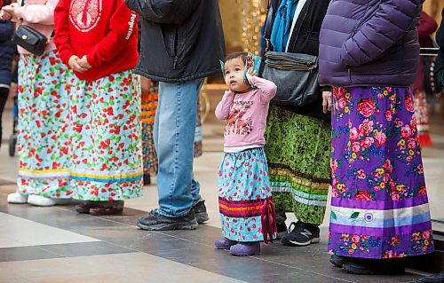 MIKE DEAL / WINNIPEG FREE PRESS
Wabigwan Greene, almost 3-yrs-old, during the first National Ribbon Skirt Day event at the Polo Park Shopping Centre on Wednesday. National Ribbon Skirt Day is held on January 4th a day where Indigenous women across the country are encouraged to wear their traditional regalia to celebrate their culture, their strength and their connection as women.
230104 - Wednesday, January 04, 2023.