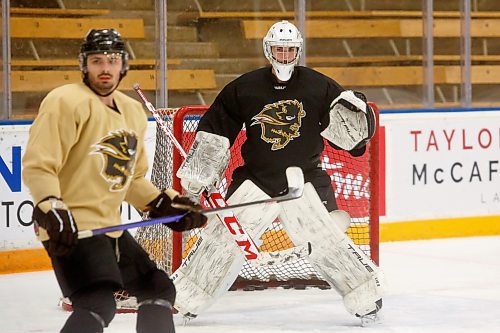 MIKE DEAL / WINNIPEG FREE PRESS
University of Manitoba Bisons Men's goaltender, Ross Hawryluk (34) during practice at the Wayne Fleming Arena Wednesday morning.
See Mike Sawatzky story
230104 - Wednesday, January 04, 2023.