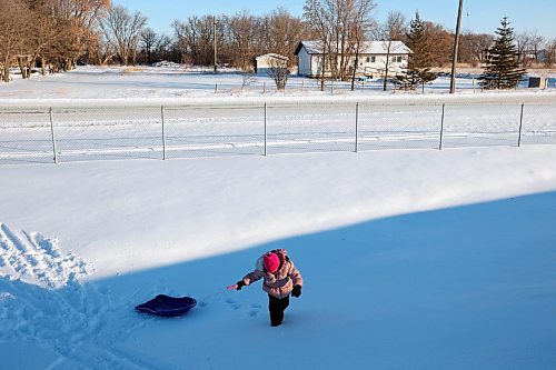 04012023
Quill Elk-Hotain pulls her sled up a hill while tobogganing with family at Sioux Valley Dakota Nation on a sunny Wednesday afternoon. 
(Tim Smith/The Brandon Sun)