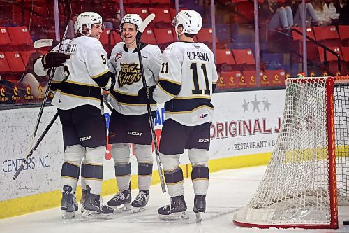 04012023
Trae Johnson #26 (C) of the Brandon Wheat Kings celebrates a goal with teammates during WHL action against the Regina Pats at Westoba Place on Wednesday evening. 
(Tim Smith/The Brandon Sun)