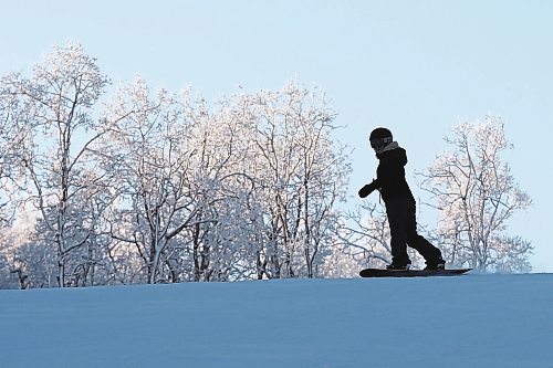 03012023
A snowboarder makes their way down a run at Asessippi Ski Resort on a sunny Tuesday. (Tim Smith/The Brandon Sun)