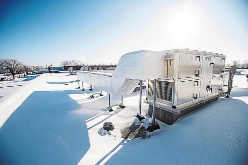 MIKAELA MACKENZIE / WINNIPEG FREE PRESS

A newer air handling unit on the roof at Sister High School in Winnipeg on Thursday, Jan. 5, 2023. For Maggie story.
Winnipeg Free Press 2023.