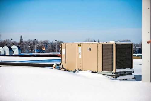 MIKAELA MACKENZIE / WINNIPEG FREE PRESS

An older air handling unit on the roof at Sisler High School in Winnipeg on Thursday, Jan. 5, 2023. For Maggie story.
Winnipeg Free Press 2023.