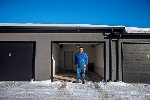 MIKAELA MACKENZIE / WINNIPEG FREE PRESS

Joey Dearborn, who is running into MPI policy issues while trying to work around the extremely long wait times in Winnipeg, poses for a photo in his empty garage in Ile des Ch&#xea;nes on Thursday, Jan. 5, 2023. For Gabby story.
Winnipeg Free Press 2023.