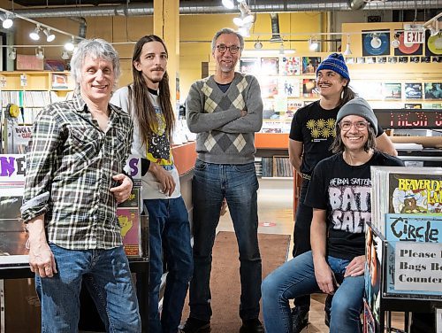 JESSICA LEE / WINNIPEG FREE PRESS
Into the Music owner Greg Tonn (centre), with employees (from left) Andy Morton, Logan Sharkey, J.P. Perron and Jay Churko.