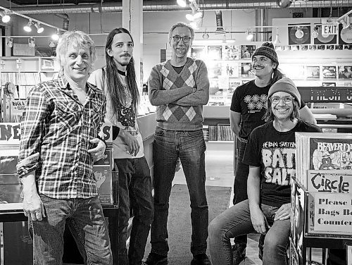JESSICA LEE / WINNIPEG FREE PRESS

Employees and Greg Tonn (centre), owner of Into the Music, are photographed at the store on December 2, 2022. From left: Andy Morton, Logan Sharkey, Greg Tonn, J.P. Perron and Jay Churko.

Reporter: Gabby Piche