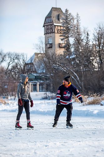 MIKAELA MACKENZIE / WINNIPEG FREE PRESS

Brandi Crones (left) and Philip Okemow skate on the Riley Family Duck Pond, which opened today, at Assiniboine Park in Winnipeg on Friday, Jan. 6, 2023. 
Winnipeg Free Press 2023.