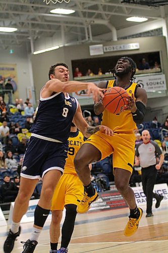 Brandon University Bobcats Eli Ampofo drives for a layup against the UBC Thunderbirds in Canada West men's basketball action at the Healthy Living Centre on Friday. (Thomas Friesen/The Brandon Sun)