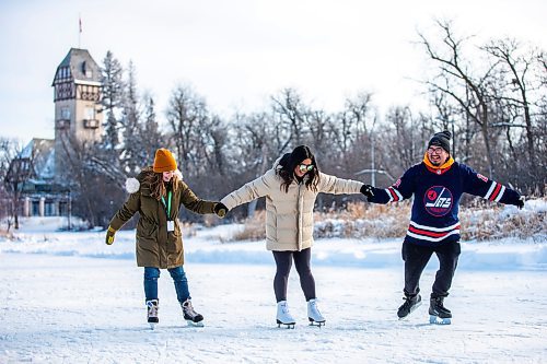 MIKAELA MACKENZIE / WINNIPEG FREE PRESS

Mallory Shore (left), Rachelle Estrel, and Philip Okemow skate on the Riley Family Duck Pond, which opened today, at Assiniboine Park in Winnipeg on Friday, Jan. 6, 2023. 
Winnipeg Free Press 2023.