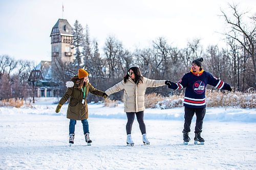 MIKAELA MACKENZIE / WINNIPEG FREE PRESS

Mallory Shore (left), Rachelle Estrel, and Philip Okemow skate on the Riley Family Duck Pond, which opened today, at Assiniboine Park in Winnipeg on Friday, Jan. 6, 2023. 
Winnipeg Free Press 2023.