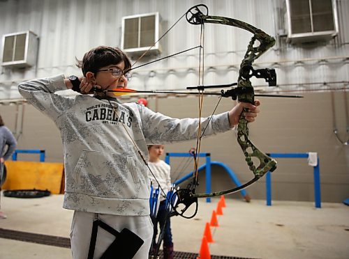 Eight year old Logan Wilson takes aim during the Manitoba Archery Challenge at the Keystone Centre on Sunday. For a story on the event, see Page A3. (Michele McDougall/The Brandon Sun)