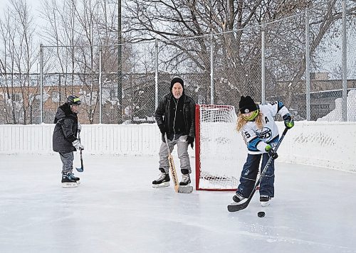 JESSICA LEE / WINNIPEG FREE PRESS

Aaron Henderson and his son, Eli, 10, play a pick-up game of hockey at Norwood Community Centre after school on January 9, 2023 with their new friend Joseph, 13 (in white).

Stand up