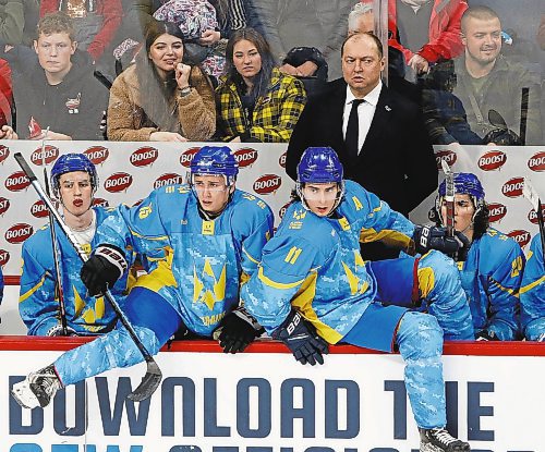 JOHN WOODS / WINNIPEG FREE PRESS
Ukraine's headcoach Vadym Shakhraichuk looks down ice as his player hit the ice during first period action against the U of MB Bisons in Winnipeg on Monday, January 9, 2023.