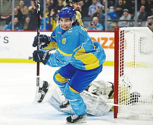 JOHN WOODS / WINNIPEG FREE PRESS
Ukraine's Mykhailo Simchuk (11) celebrates his goal against the U of MB Bisons during first period action in Winnipeg on Monday, January 9, 2023.