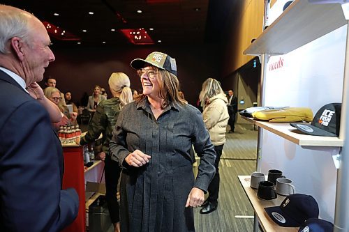 RUTH BONNEVILLE / WINNIPEG FREE PRESS 

BIZ - travel mb campaign launch

Premier Heather Stefanson laughs with Colin Ferguson, President and CEO of Travel Manitoba as she tries on a locally produced cap at pop-up store at the launch Monday.   

Premier Heather Stefanson, Colin Ferguson, President and CEO of Travel Manitoba , Kiirsten May and Alex Varricchio, Co-owners of UpHouse Inc. at the launch of Travel Manitoba's new campaign at the Convention Centre Monday. 

Reporter Gabby


Jan 9th,  2023