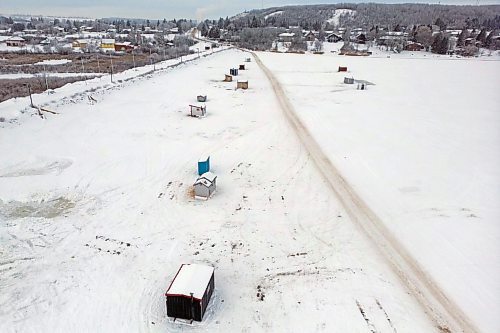 09012023
Ice-fishing shacks line the south end of Minnedosa Lake by the dam on a grey Monday.
(Tim Smith/The Brandon Sun)