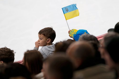 JOHN WOODS / WINNIPEG FREE PRESS
Children wave a Ukraine at a U of MB Bisons and Ukraine during first period action in Winnipeg on Monday, January 9, 2023.